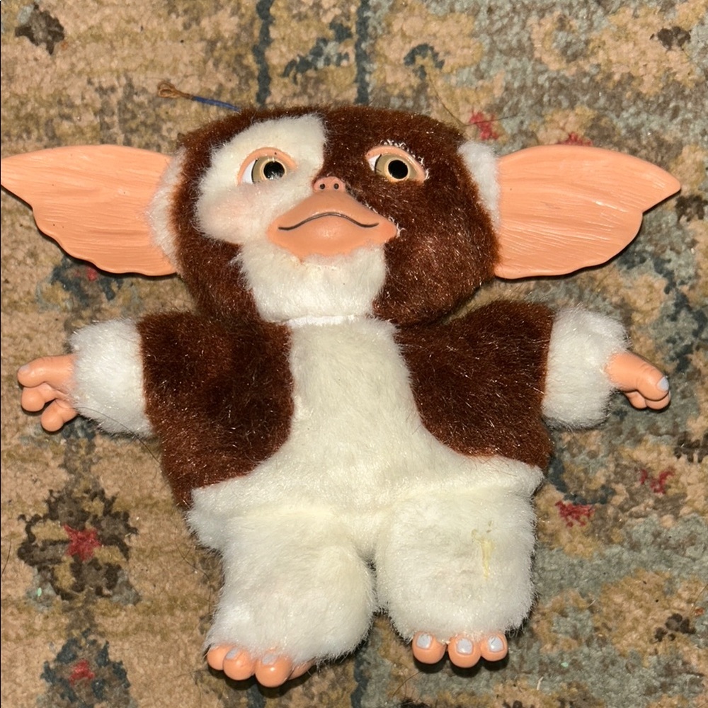 Brown and White Plush Toy